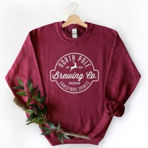 North Pole Brewing Co Christmas Spirit Christmas Sweatshirt Sweatshirt Maroon S