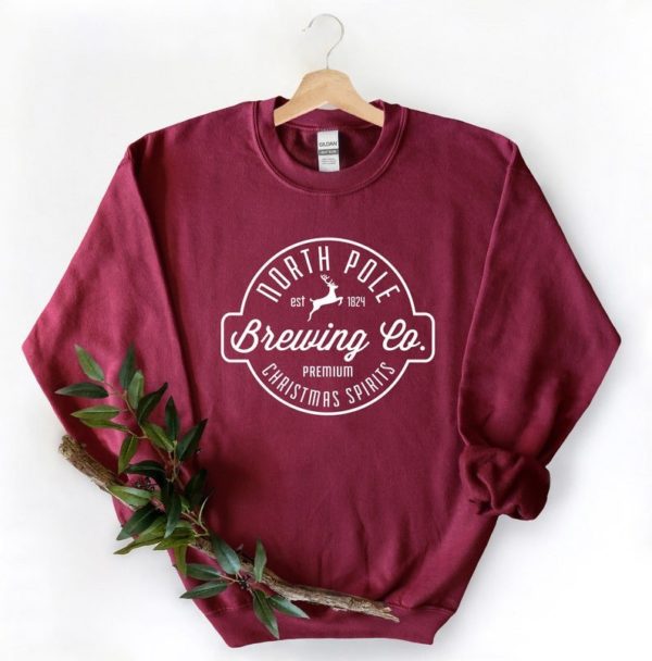 North Pole Brewing Co Christmas Spirit Christmas Sweatshirt Sweatshirt Maroon S