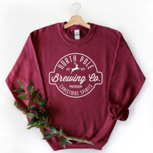 North Pole Brewing Co Premium Christmas Spirit Sweatshirt Sweatshirt Maroon S