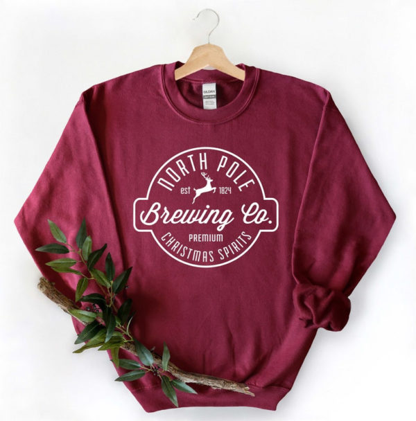 North Pole Brewing Co Premium Christmas Spirit Sweatshirt Sweatshirt Maroon S