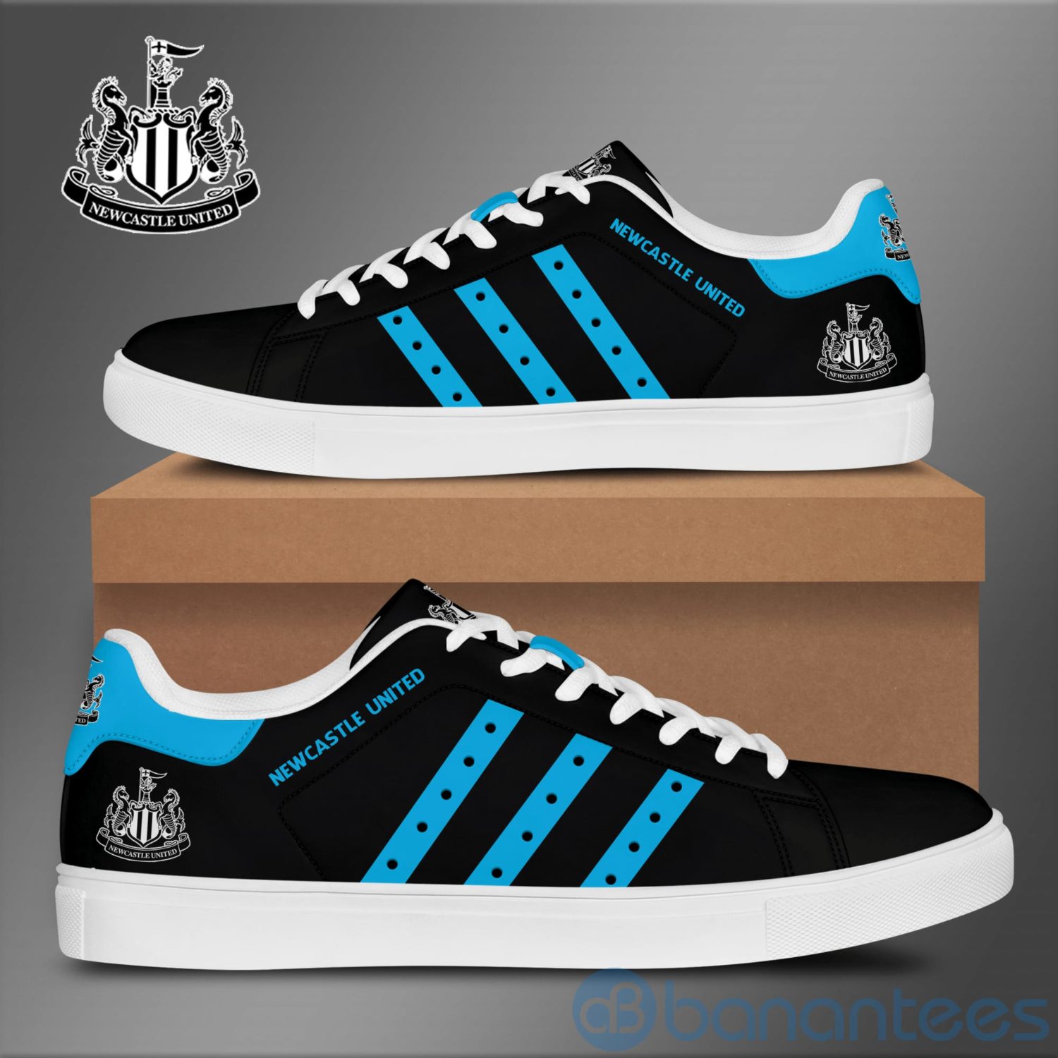 newcastle-united-blue-striped-low-top-skate-shoes-1-rbf6a.jpg Newcastle United Blue Striped Low Top Skate Shoes Product Photo