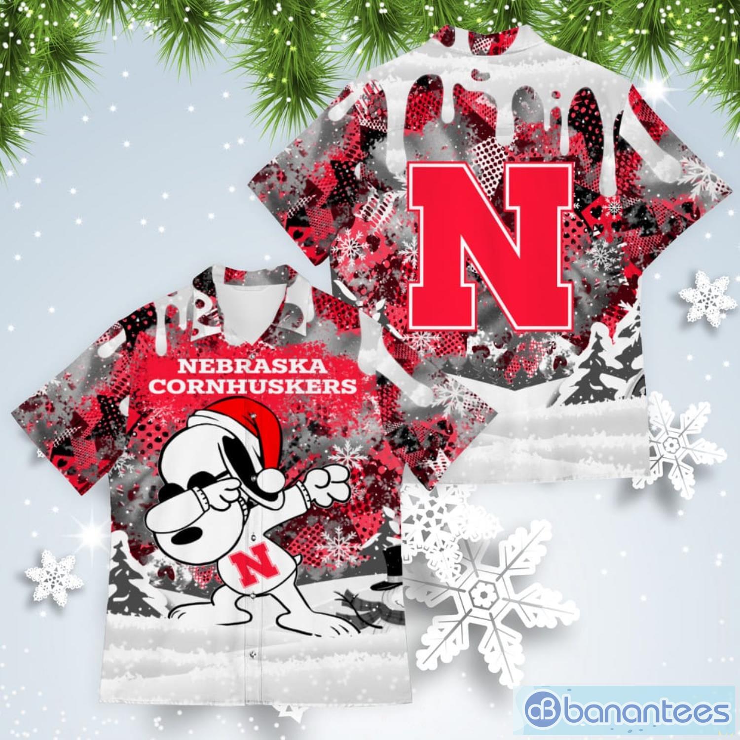 Nebraska Cornhuskers Snoopy Dabbing The Peanuts American Christmas Dripping Hawaiian Shirt Product Photo 1 Nebraska Cornhuskers Snoopy Dabbing The Peanuts American Christmas Dripping Hawaiian Shirt Product Photo 1