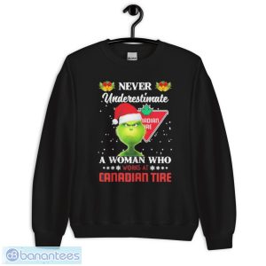 Santa Grinch never underestimate a woman who works at Canadian Tire Christmas shirt - Unisex Crewneck Sweatshirt