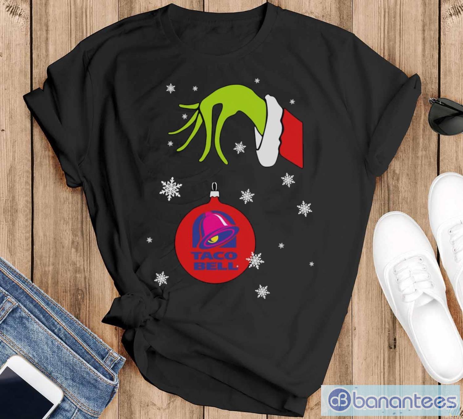 grinch hand holding ornament taco bell snowflake christmas sweater image Grinch Hand holding Ornament Taco Bell Snowflake Christmas Sweater - Black T-Shirt
