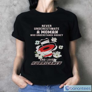 Official Never Underestimate A Woman Who Understands Hockey And Loves Carolina Hurricanes Shirt - Ladies T-Shirt