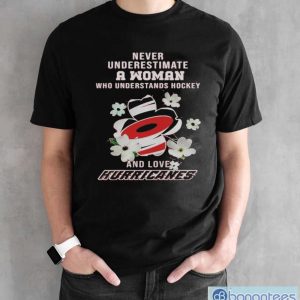 Official Never Underestimate A Woman Who Understands Hockey And Loves Carolina Hurricanes Shirt - Black Unisex T-Shirt