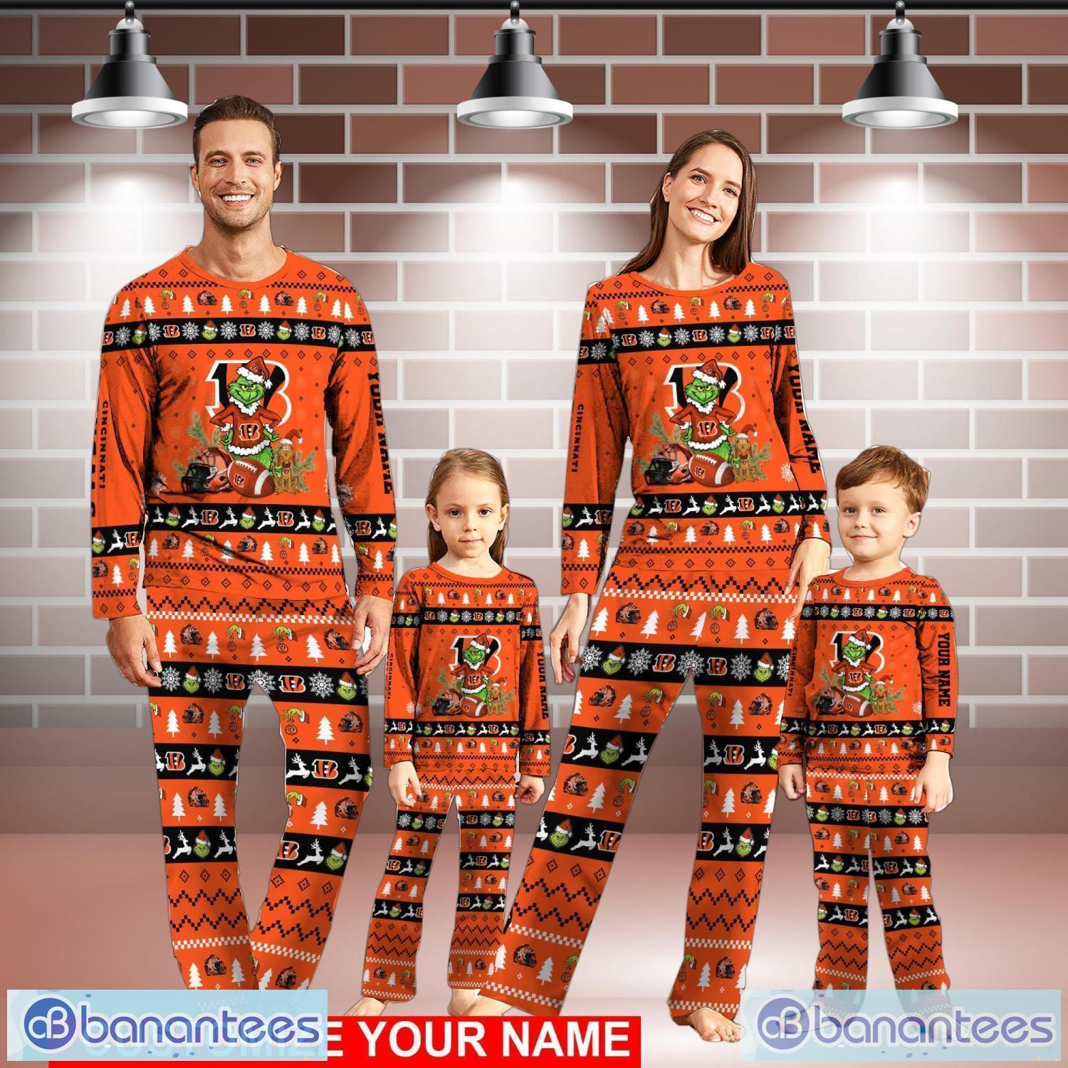 https://image.banantees.com/2023/12/cincinnati-bengals-pajamas-set-custom-name-grinch-christmas-pajama-set-family-christmas-gift.jpg