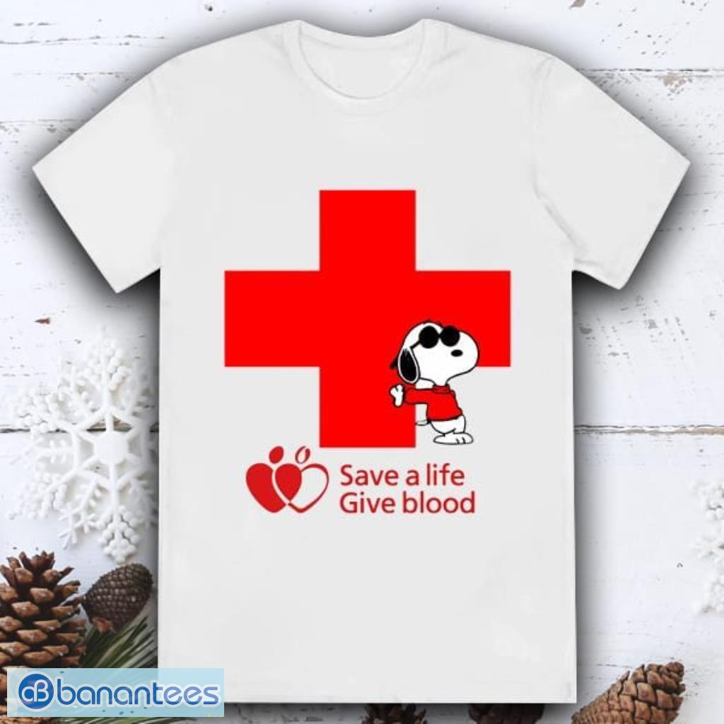 save a life snoopy red cross snoopy blood donation shirt image Save A Life Snoopy Red Cross Snoopy Blood Donation Shirt Product Photo 1