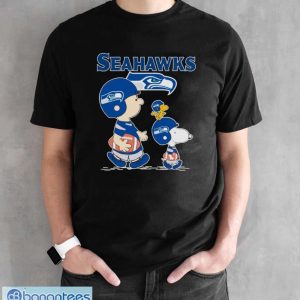 Original seattle Seahawks Let’s Play Football Together Snoopy Charlie Brown And Woodstock Shirt - Black Unisex T-Shirt