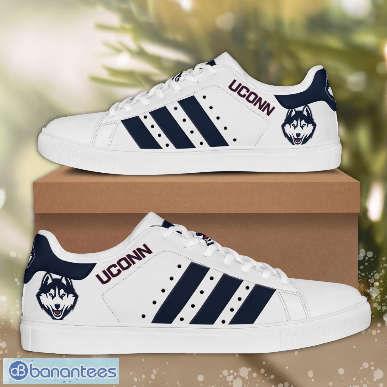 uconn huskies ncaa low top skate shoes fans gift sport shoes image UConn Huskies NCAA Low Top Skate Shoes Fans Gift Sport Shoes Product Photo 1