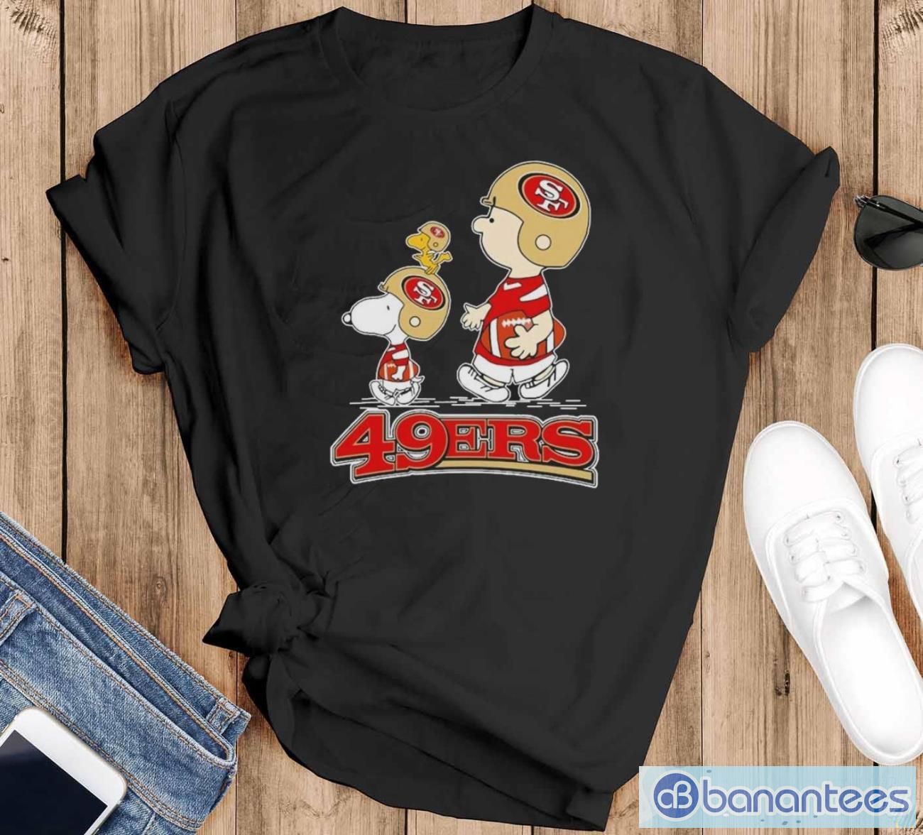 peanuts charlie brown snoopy and woodstock san francisco 49ers walking shirt image Peanuts Charlie Brown Snoopy And Woodstock San Francisco 49ers Walking Shirt - Black T-Shirt
