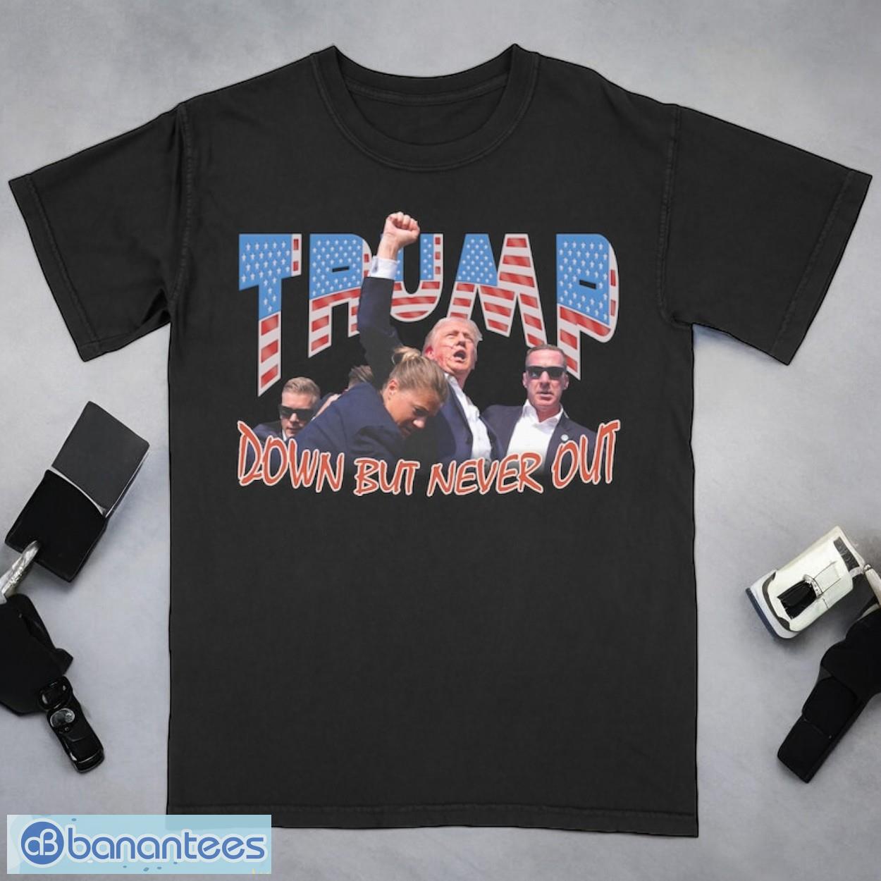 down but never out donald trump shooting 2024 shirt image Down But Never Out Donald Trump Shooting 2024 Shirt Product Photo 1