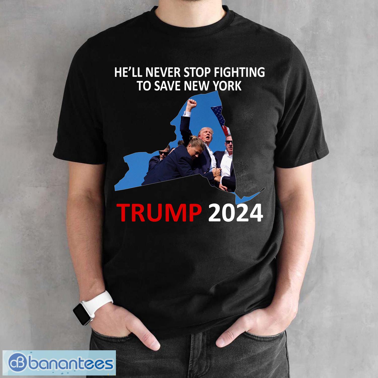 he will never stop fighting to save new york trump 2024 shirt hoodie image He Will Never Stop Fighting To Save New York Trump 2024 Shirt Hoodie - He Will Never Stop Fighting To Save New York Trump 2024 Black Shirt Photo 1
