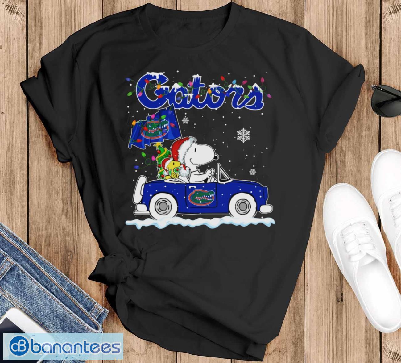 florida gators snoopy and woodstock driving car cute snoopy limited edition shirt image Florida Gators Snoopy And Woodstock Driving Car Cute Snoopy Limited Edition Shirt - Black T-Shirt