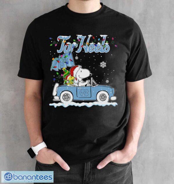 North Carolina Tar Heels Snoopy And Woodstock Driving Car Cute Snoopy Limited Edition Shirt - Black Unisex T-Shirt