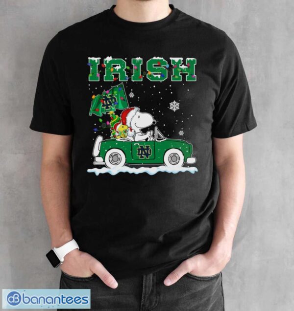 Notre Dame Fighting Irish Snoopy And Woodstock Driving Car Cute Snoopy Limited Edition Shirt - Black Unisex T-Shirt