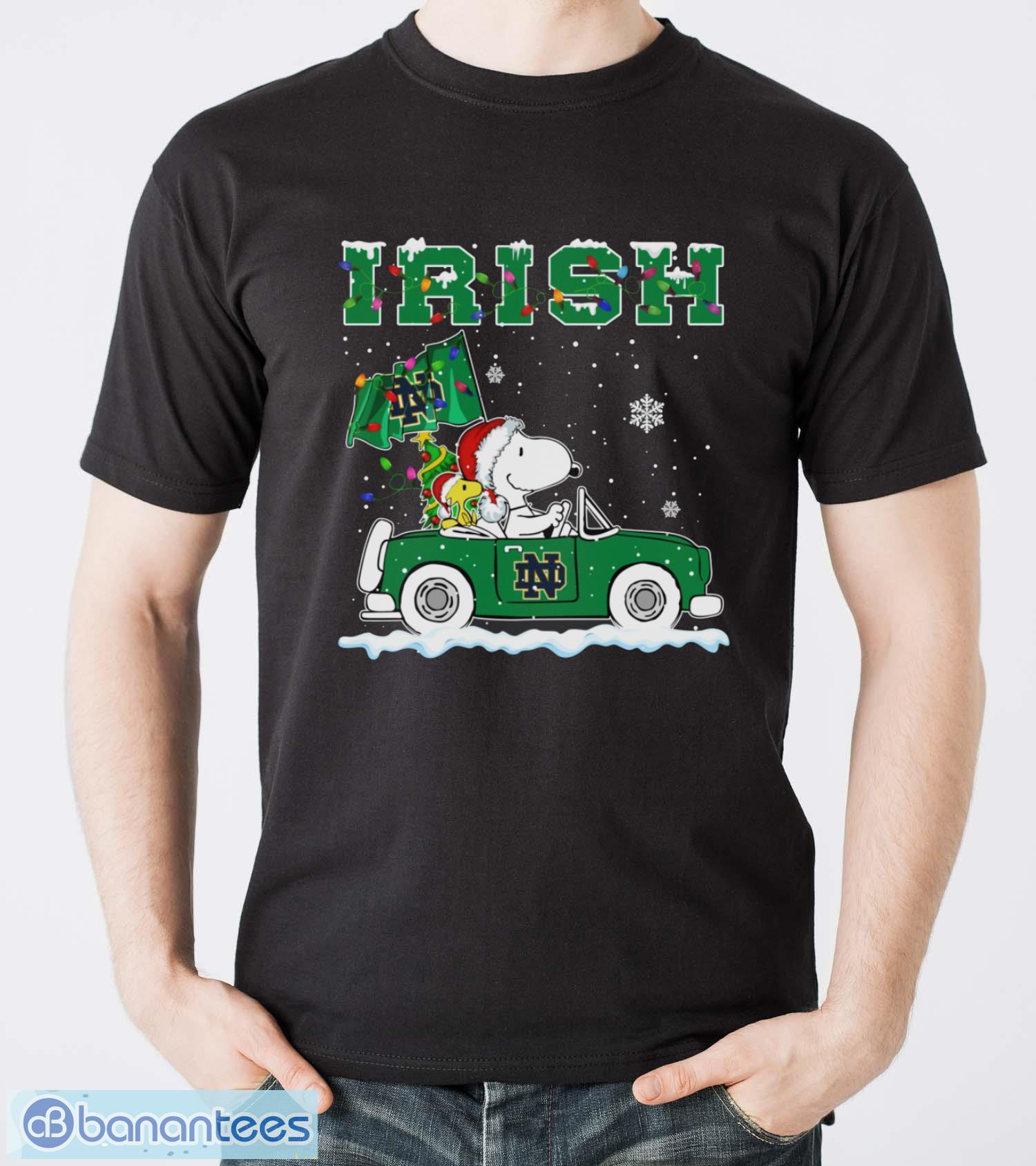 notre dame fighting irish snoopy and woodstock driving car shirt sweatshirt hoodie image Notre Dame Fighting Irish Snoopy And Woodstock Driving Car Shirt Sweatshirt Hoodie - Men T-Shirt